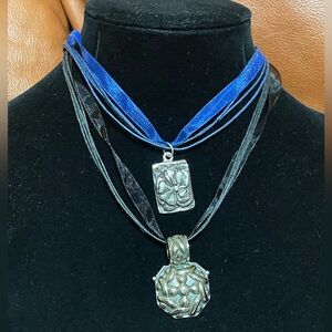 Set of 2 Silver Toned Embossed Metal Pendants On Ribbon Necklace.